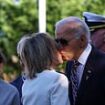 Emotional Biden has to be guided on stage and kisses his sister on the lips at plaque unveiling for late son Beau