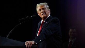 Donald Trump takes the stage following early results from the 2024 U.S. presidential election in Palm Beach County Convention Center, in West Palm Beach, Florida, U.S., November 6, 2024. REUTERS/Callaghan O'Hare/File Photo/File Photo