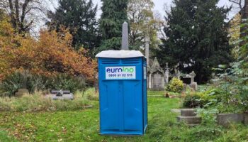 Widower says wife's grave was 'violated' as church fits portable toilet in graveyard