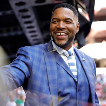 Michael Strahan defended by co-host after failing to put his hand over his heart during national anthem