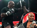 Mike Tyson BATTERS his trainer and shows off his ripped torso to leave fans thinking fight against Jake Paul, 27, is 'already done' despite 31-year age gap