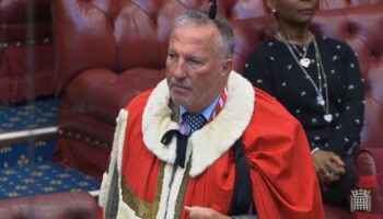 Former England cricketer Ian Botham takes up his seat in the House of Lords as Baron Botham of Ravensworth.