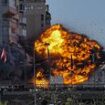 Astonishing moment Israeli rocket slams into Beirut tower block before it collapses in huge fireball explosion