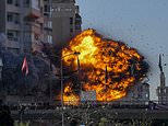 Astonishing moment Israeli rocket slams into Beirut tower block before it collapses in huge fireball explosion