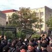 Moment enraged crowd ram truck through fence and storm parliament building to scupper major deal with Putin in Russian-backed breakaway Georgian region