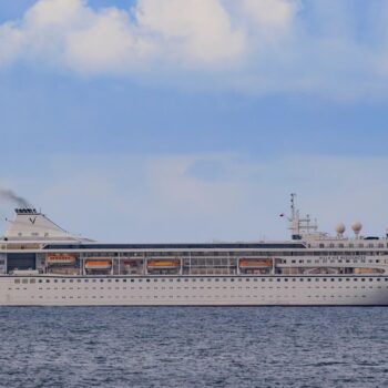 Villa Vie Odyssey cruise ship leaving Belfast Lough after being anchored off the coast on Bangor, Northern Ireland. The luxury cruise ship became marooned in Belfast for four months due to unexpected repair works and has finally got underway. Picture date: Thursday October 03, 2024.