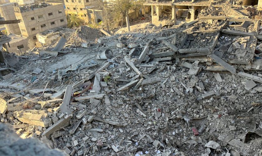 A multi-storey residential building lies in ruins following an Israeli strike in Beit Lahiya in northern Gaza. Pic: Reuters