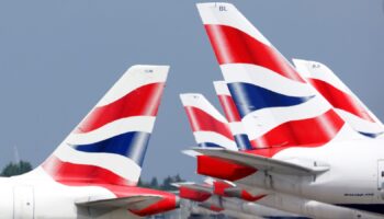 British Airways tail fins are pictured at Heathrow Airport in London, Britain, May 17, 2021. REUTERS/John Sibley