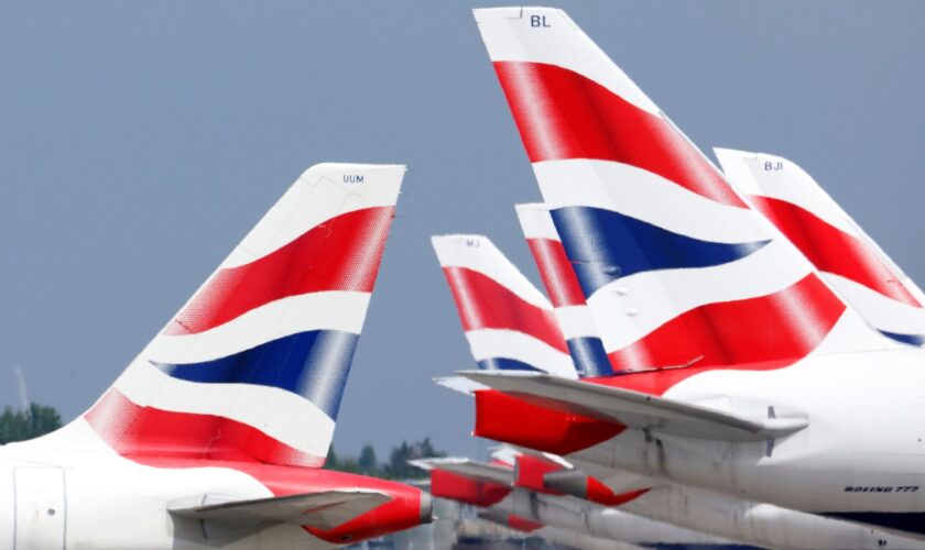 British Airways tail fins are pictured at Heathrow Airport in London, Britain, May 17, 2021. REUTERS/John Sibley