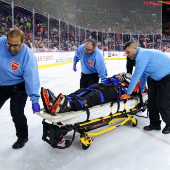 NHL ref leaves game on stretcher after colliding with Avalanche player