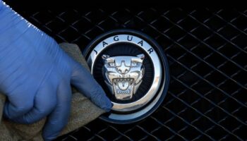 Jaguar unveils new logo and look for cars after taking a year off