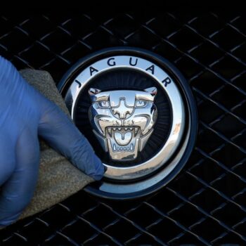 Jaguar unveils new logo and look for cars after taking a year off