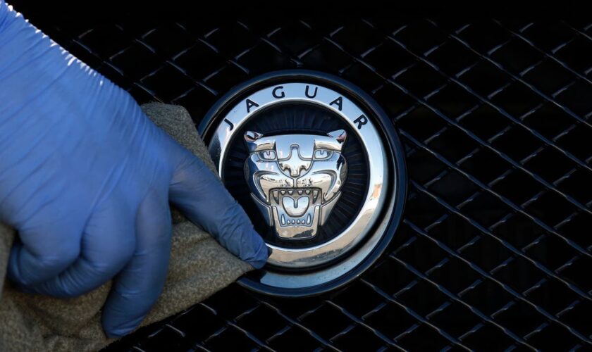 Jaguar unveils new logo and look for cars after taking a year off