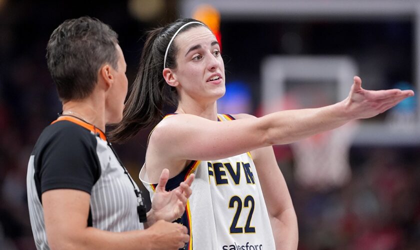 WNBA star Caitlin Clark spotted jawing at referees from the stands during Iowa game