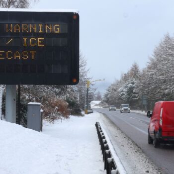 A sign displays a warning at the side of the A9 near Aviemore, Scotland, Britain November 21, 2024 REUTERS/Russell Cheyne