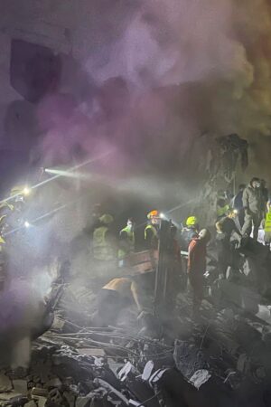 Rescue workers at the site. Pic: AP