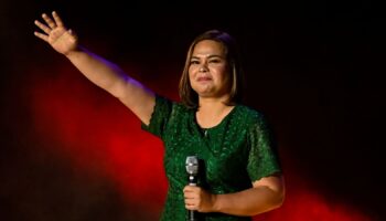 Vice-presidential candidate Sara Duterte-Carpio, daughter of Philippine President Rodrigo Duterte, waves to her supporters during the first day of campaign period for the 2022 presidential election, at the Philippine Arena, in Bocaue, Bulacan province, Philippines, February 8, 2022. REUTERS/Lisa Marie David