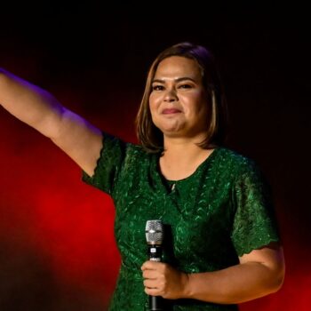 Vice-presidential candidate Sara Duterte-Carpio, daughter of Philippine President Rodrigo Duterte, waves to her supporters during the first day of campaign period for the 2022 presidential election, at the Philippine Arena, in Bocaue, Bulacan province, Philippines, February 8, 2022. REUTERS/Lisa Marie David