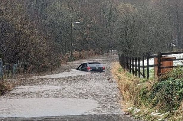 Storm Bert horror as baby is trapped inside car sinking in floodwater in front of mum