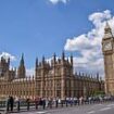 Police swarm Westminster Bridge after man stabbed in front of horrified tourists metres from the Houses of Parliament - as officers arrest four people following 'attempted murder'