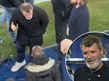 Roy Keane furiously confronts fan who was abusing him following Man United's 1-1 draw at Portman Road... after group of supporters shout 'F*** YOU' at former Ipswich manager