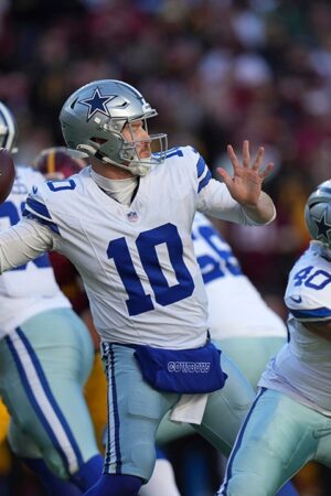 Cowboys score 24 points in 4th quarter for narrow victory over Commanders in bizarre game