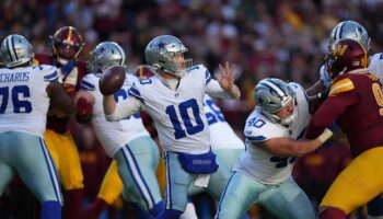 Cowboys score 24 points in 4th quarter for narrow victory over Commanders in bizarre game