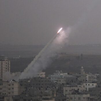 Smoke trails are seen as a rocket is launched from the northern Gaza Strip towards Israel November 17, 2012. Palestinian militants fired a rocket at Tel Aviv on Saturday but it was intercepted in mid-air by a newly deployed Israeli anti-missile battery and caused no casualties or damage, police said. REUTERS/Majdi Fathi (GAZA - Tags: CIVIL UNREST MILITARY POLITICS)