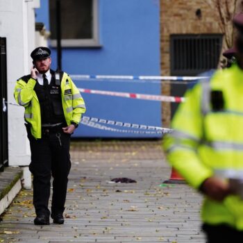 Arrest after girl, 8, and man seriously injured in west London car shooting