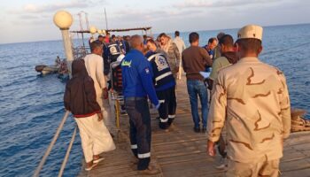 Two Britons believed to be among 16 missing as tourist boat sinks after being 'hit by large wave'