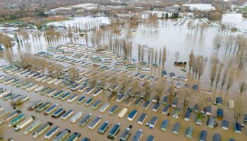 Flooded caravans at Billing Aquadrome Holiday Park near Northampton, Northamptonshire. Storm Bert will continue to bring disruption into Monday after torrential downpours caused "devastating" flooding over the weekend. Picture date: Monday November 25, 2024. PA Photo. See PA story WEATHER Bert. Photo credit should read: Jordan Pettitt/PA Wire