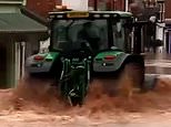 Tractor driver, 57, is arrested after driving through flooded high street during Storm Bert