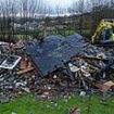 The house destroyed by Bert: Dramatic images show remains of Welsh home that had to be demolished after side was ripped off in strong winds