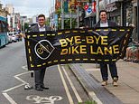 End of the road for £1.7m bike lane from hell: Hated scheme set to be scrapped after injuring cyclists and pedestrians and hammering small businesses (but it will cost more than a million to get rid of)