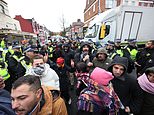 Moment police clash with protesters after arresting seven Kurdish terror suspects in London