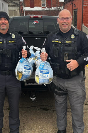 Police hand out Thanksgiving turkeys instead of traffic tickets to offenders on the road