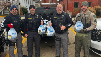 Police hand out Thanksgiving turkeys instead of traffic tickets to offenders on the road