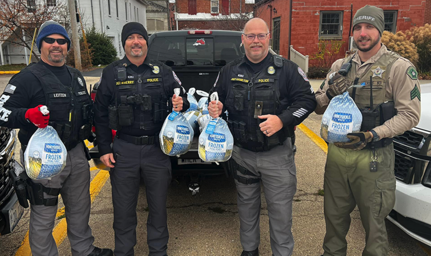 Police hand out Thanksgiving turkeys instead of traffic tickets to offenders on the road