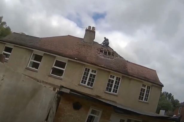 Bitter neighbour dispute ends with thug smashing giant hole in roof to destroy entire house