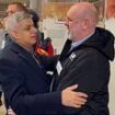 Sadiq Khan gives Aslef union boss Mick Whelan a massive hug at launch of London Overground's 'woke' rebranding that cost the public £6.3million