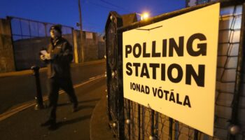 A man enters a Polling Station in Athy, Co Kildare as polls open for the Irish General Election. PA Photo. Picture date: Saturday February 8, 2020. See PA story IRISH Election. Photo credit should read: Niall Carson/PA Wire