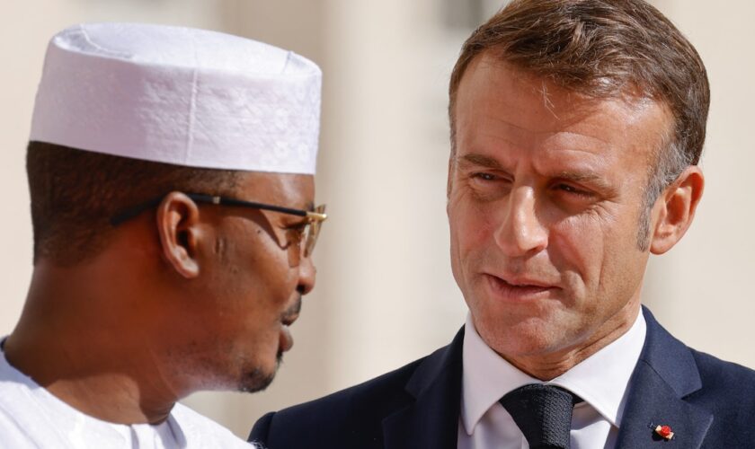 France's President Emmanuel Macron (R) greets Chad's President Mahamat Idriss Deby as he arrives to attend the 19th Summit of the Francophonie at the "Cite internationale de la langue francaise" in the castle of Villers-Cotterets, north-eastern France, on October 4, 2024. French President Emmanuel Macron hosts dozens of leaders of French-speaking countries for a summit he hopes will help boost French influence in a world beset by crises, in particular Africa. The leaders will gather from Ocotber 4 to 5 for the "Francophonie" summit, the first time the event has been held in France for 33 years. (Photo by Ludovic MARIN / AFP)