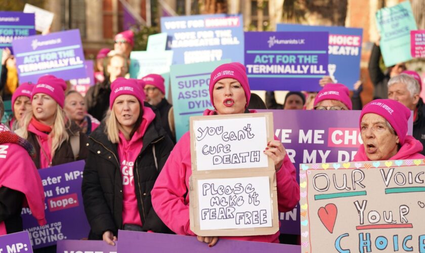 People take part in a demonstration organised by campaign group Dignity in Dying outside the Houses of Parliament in Westminster, London, in support of the Terminally Ill Adults (End of Life) Bill. Picture date: Friday November 29, 2024.