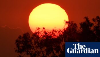 Australia’s heatwave to continue into next week as east coast braces for possible severe storms