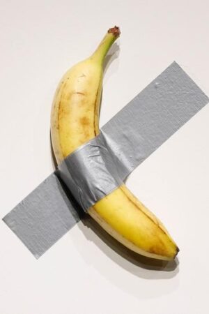 Banana taped to wall sells for $6.2M in New York art auction