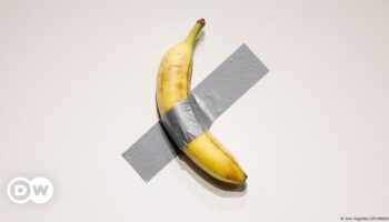 Banana taped to wall sells for $6.2M in New York art auction