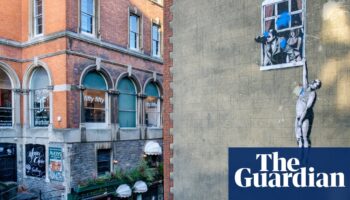 Banksy’s Well Hung Lover to be sold with Bristol building it is painted on