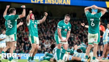 Ireland players celebrate at the final whistle