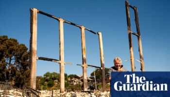 California fire crews make progress against wildfire that burned homes to rubble