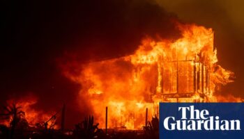 Californians forced to flee as ferocious wildfires destroy homes and buildings